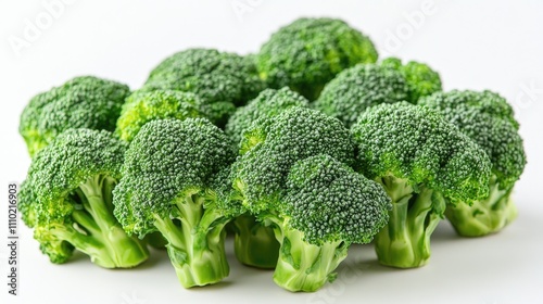 Fresh green broccoli bunch on a clean white background showcasing healthy eating and vibrant vegetables for nutrition and cooking concepts.