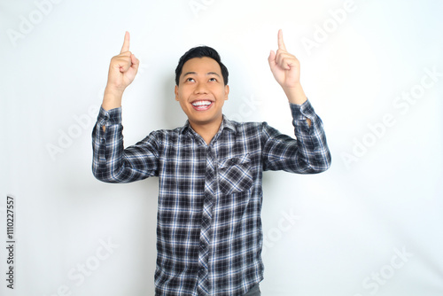 happy asian man pointing hand with smiling face and confident gesture isolated on white backgroun wearing plaid shirt