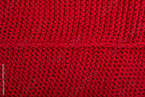 Woolen knitted background. Red textured sweater Christmas Fabric photo