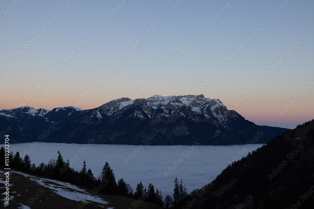 Sunrise over lake lucerne, lucerne, switzerland with a sea of fog. Sunrise over lake lucerne, lucerne, switzerland with a sea of fog.