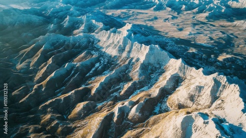 Majestic mountain ridges reveal stunning textures and patterns in the golden light of sunset in a remote landscape