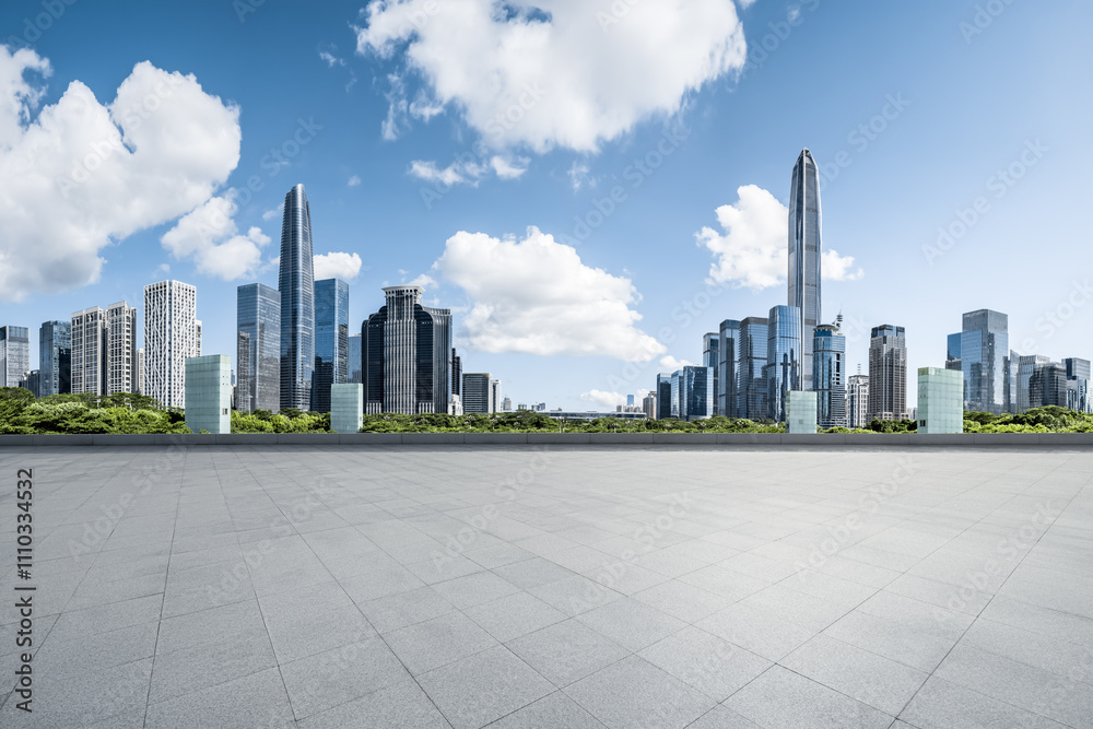 Empty square floor and cityscape with skyline in modern city Empty square floor and cityscape with skyline in modern city