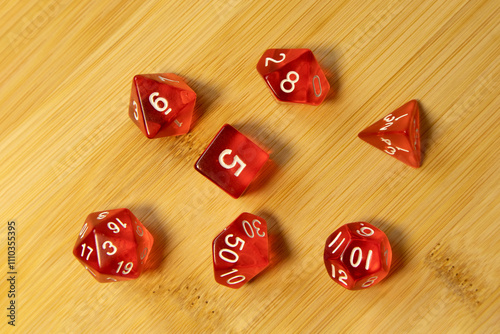 Set of dice for fantasy dnd and rpg tabletop games Board game polyhedral dices with different sides on wood background