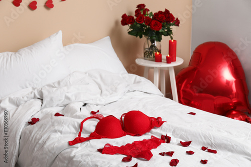 Romantic bedroom scene with...