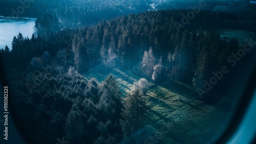 A view of dark forest from the aiplane window  photo