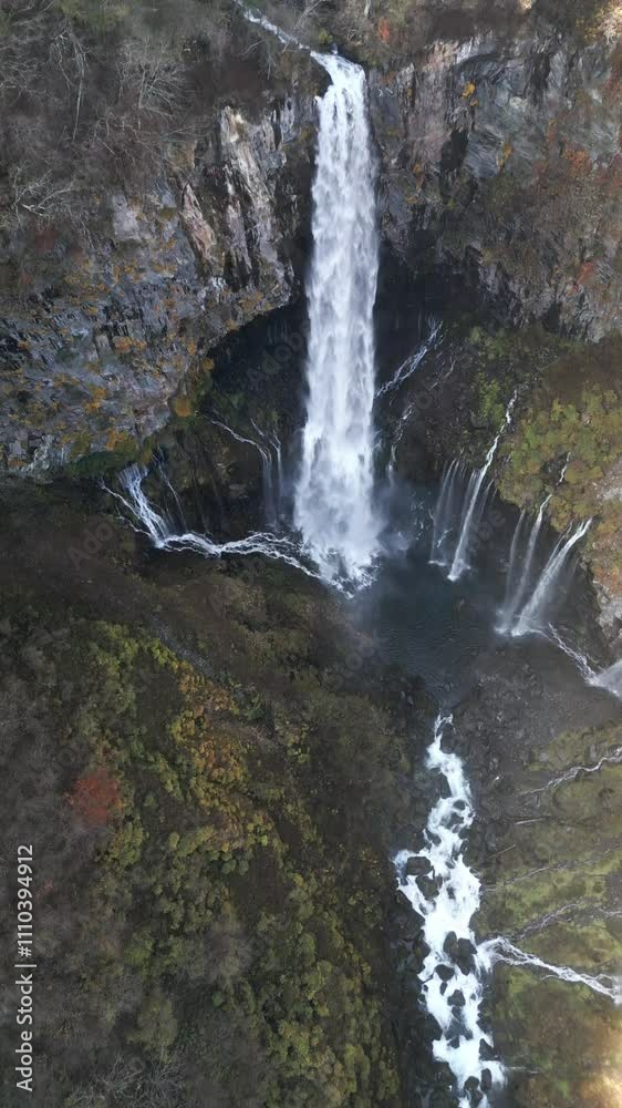 View on stunning high waterfall in the mountains with multiple streams