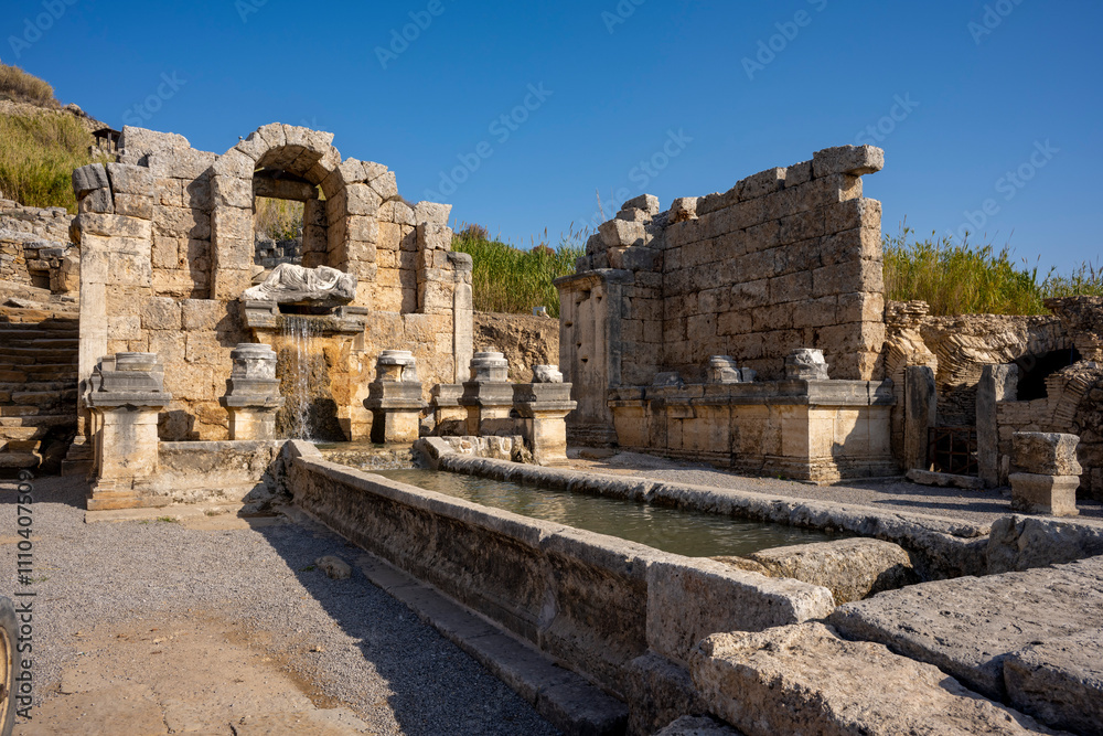Rows of columns in Perge, Antalya, Turkey. Remains of colonnaded street in Pamphylian ancient city.Rows of columns in Perge, Antalya, Turkey. Ancient Kestros Fountain. Aksu, Antalya Rows of columns in Perge, Antalya, Turkey. Remains of colonnaded street in Pamphylian ancient city.Rows of columns in Perge, Antalya, Turkey. Ancient Kestros Fountain. Aksu, Antalya
