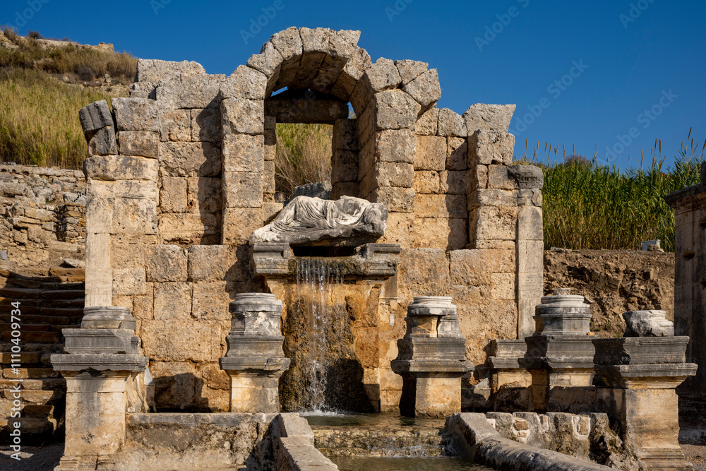 Rows of columns in Perge, Antalya, Turkey. Remains of colonnaded street in Pamphylian ancient city.Rows of columns in Perge, Antalya, Turkey. Ancient Kestros Fountain. Aksu, Antalya Rows of columns in Perge, Antalya, Turkey. Remains of colonnaded street in Pamphylian ancient city.Rows of columns in Perge, Antalya, Turkey. Ancient Kestros Fountain. Aksu, Antalya