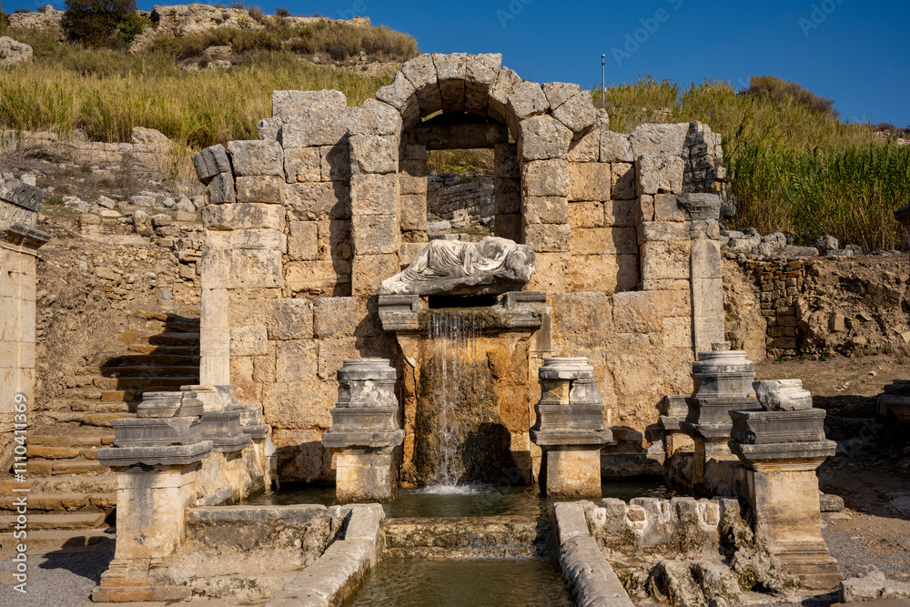 Rows of columns in Perge, Antalya, Turkey. Remains of colonnaded street in Pamphylian ancient city.Rows of columns in Perge, Antalya, Turkey. Ancient Kestros Fountain. Aksu, Antalya Rows of columns in Perge, Antalya, Turkey. Remains of colonnaded street in Pamphylian ancient city.Rows of columns in Perge, Antalya, Turkey. Ancient Kestros Fountain. Aksu, Antalya