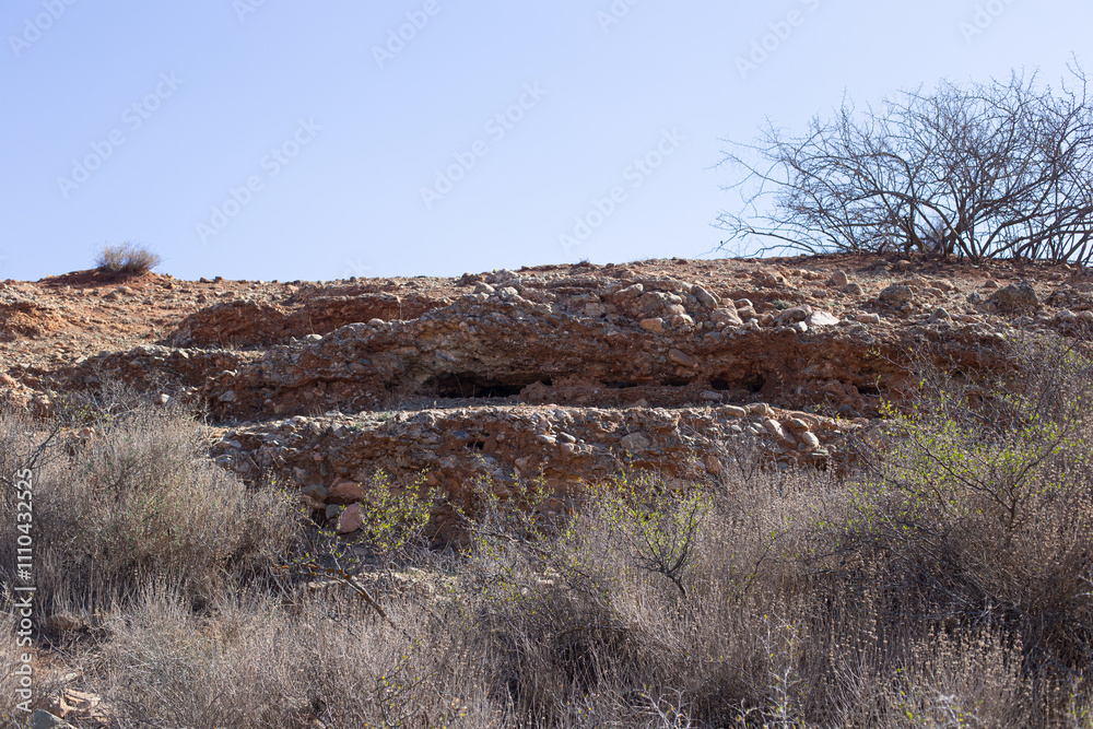 Close-up of sedimentary rock layers in a geological formation, located 50 km south of Marrakech, Morocco.