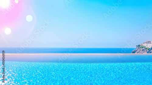 Serene Infinity Pool Overlooking Bright Blue Ocean and Clear Sky