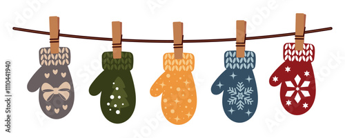 Mittens hanging on rope. Collection of colorful mittens with Christmas patterns. Warm accessory for winter. Decorative element for Christmas design.