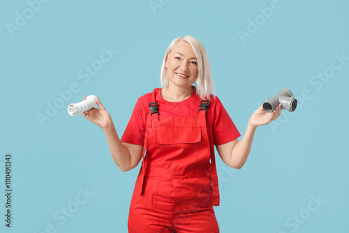 Mature female plumber with ...