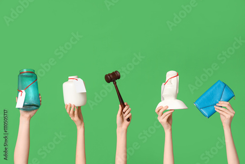 Female hands with auction g...