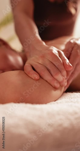 Close up of woman having relaxing back massage - vertical video