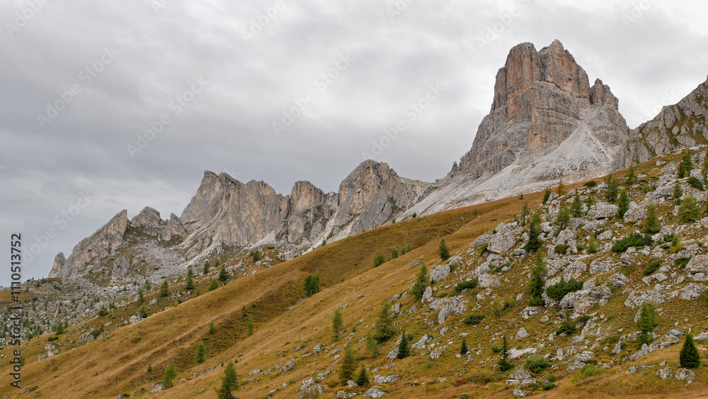 Naklejka premium Limestone mountains rock towers in the Italian Dolomites autumn landscape