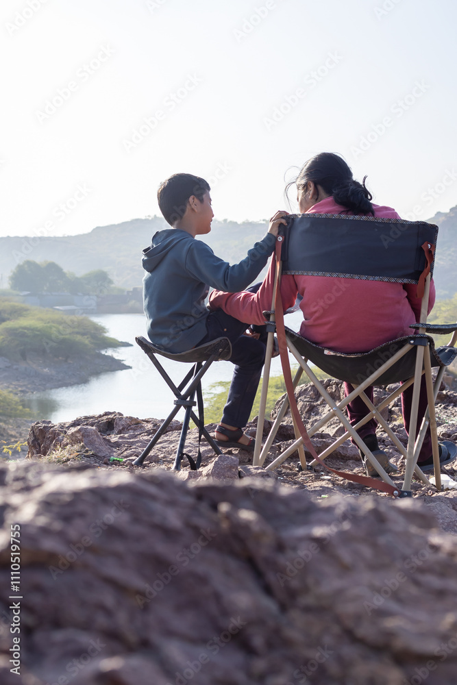 Mother and Son Bonding at Mountain Top with Lake View Mother and Son Bonding at Mountain Top with Lake View