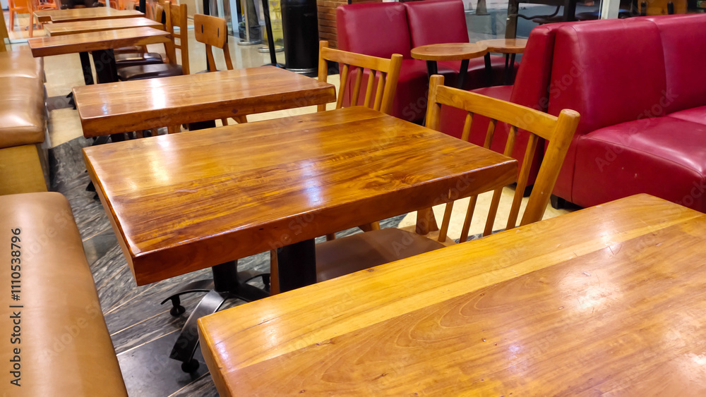 © Robert Yap - Jakarta, Indonesia - August 31, 2024 : Empty tables and chairs without visitors at one of the retail coffee drink sellers. © Robert Yap - Jakarta, Indonesia - August 31, 2024 : Empty tables and chairs without visitors at one of the retail coffee drink sellers.