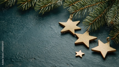 Starry christmas background with pine branches and golden stars