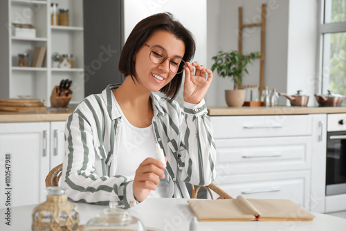Young woman with eyeglasses...