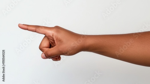 Hand pointing to the side with the index finger extended, isolated on a clean white background. Ideal for concepts of direction, instruction, or emphasis.