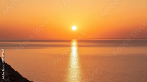 Travel image showing the orange sky of the sunset over the sea