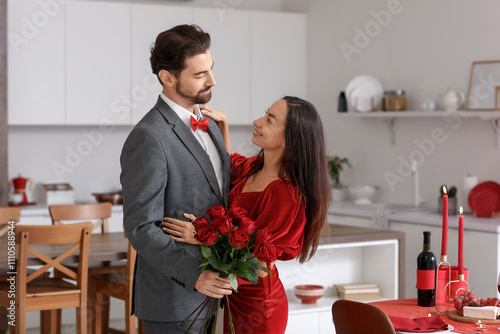 Loving couple with bouquet ...