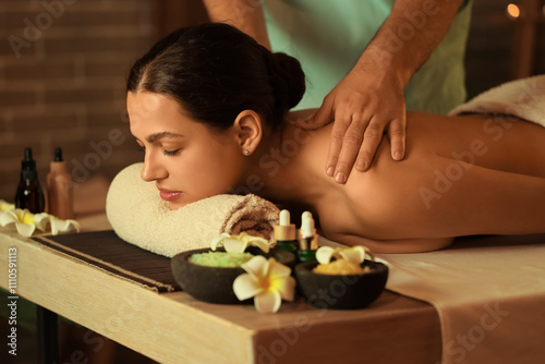 Young woman getting massage...
