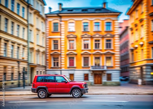 A Dynamic Tilt-Shift Perspective of a Red SUV Driving Through Riga Streets with Motion Blur Capturing the Essence of Urban Mobility on a March Day