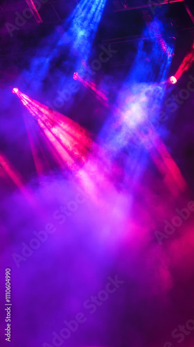 Colorful stage lights with purple and pink smoke, vibrant concert atmosphere