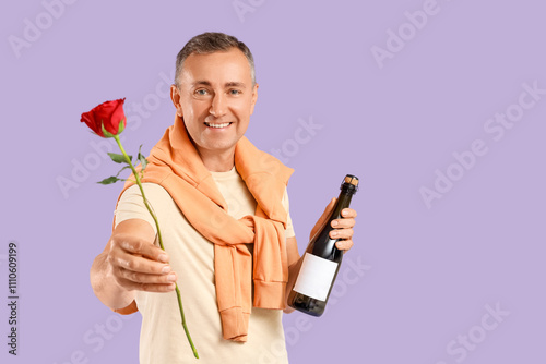 Happy mature man with rose ...