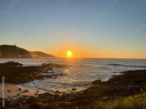 Amanecer en el litoral de Baiona, Galicia photo