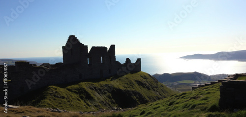 Majestic and abandoned, the crumbling stone walls of Fort George rise from the hillside like a sentinel, its moss-covered battlements shrouded in mystery as the distant waters of St. John's Harbour.