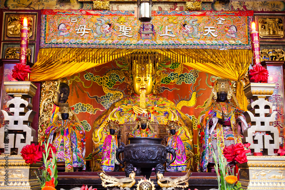 Naklejka premium The main hall of the Great Mazu Temple in Tainan, Taiwan, enshrined statues of Mazu. the Mazu is a deified form of the medieval Fujianese shamaness Lin Moniang.