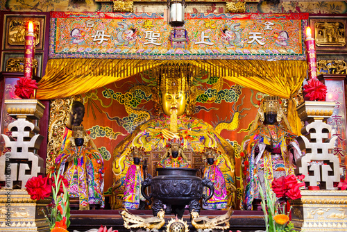 The main hall of the Great Mazu Temple in Tainan, Taiwan, enshrined statues of Mazu. the Mazu is a deified form of the medieval Fujianese shamaness Lin Moniang. photo