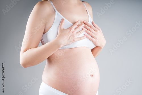Canvas Print Breast pain during pregnancy, swelling of mammary glands, breastfeeding concept