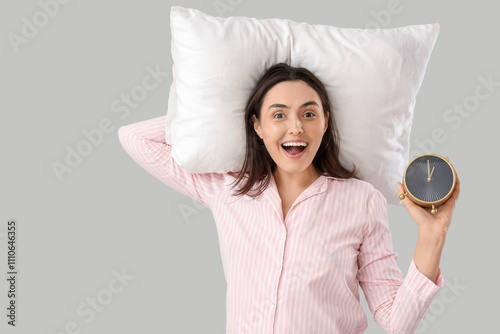 Young woman in striped paja...