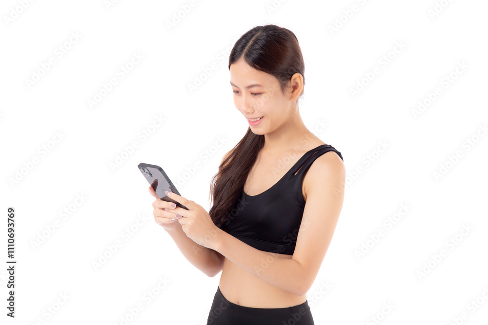 A fit young asian woman in sportswear using a smart phone, possibly managing her fitness routine isolated white background, active woman using smartphone in sportswear, sport and health. A fit young asian woman in sportswear using a smart phone, possibly managing her fitness routine isolated white background, active woman using smartphone in sportswear, sport and health.