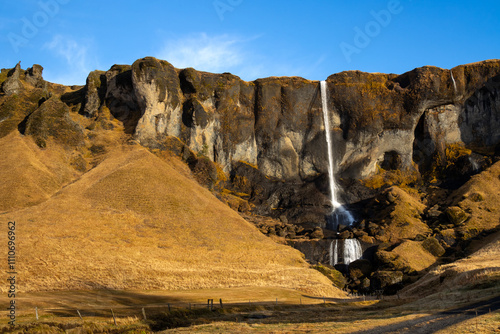 Mountain and waterfall Foss a Sidu, south Iceland photo