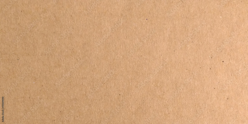 Old paper or carboard texture in subtle brown tones. Best for grunge project. Vector seamless texture of kraft paper background. 