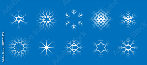 Trendy dotted snowflakes collection. Set of halftone dots elements isolated on blue backdrop