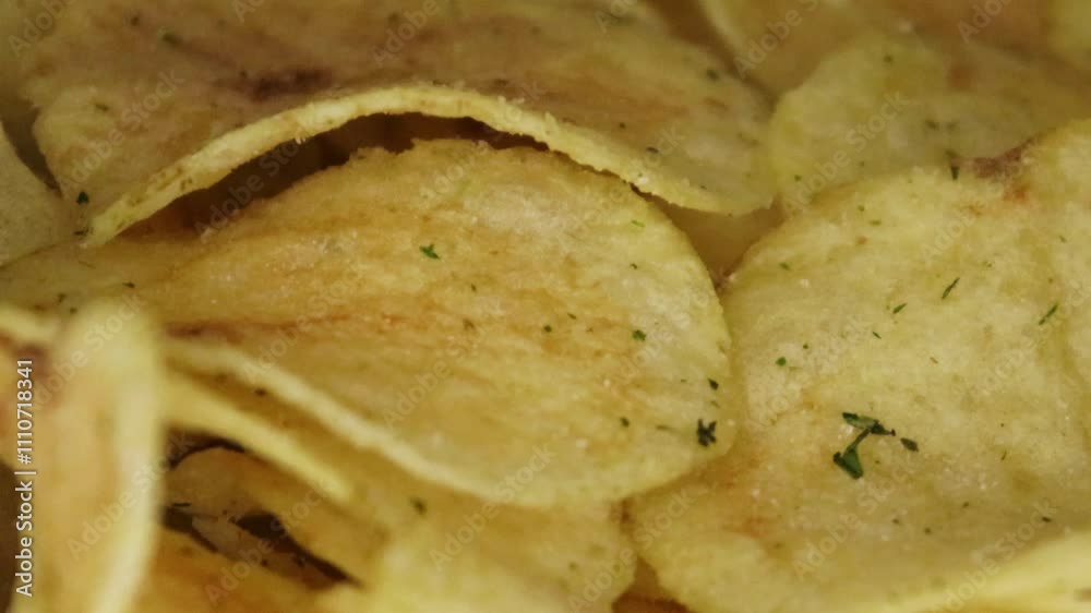 Golden fried crispy potato chips in a snack plate
Golden fried crispy potato chips in a snack plate