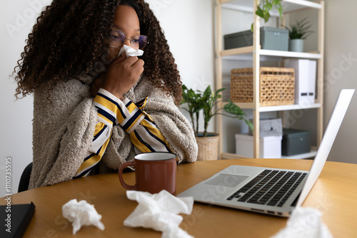 Billede på lærred Sick Black woman working from home office