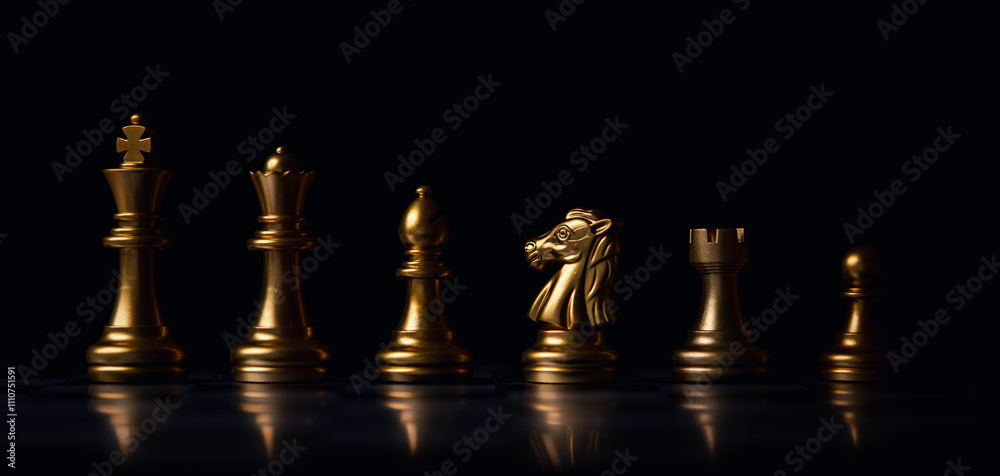 Golden chess include king queen horse ship and pawn on dark background. Golden chess include king queen horse ship and pawn on dark background.