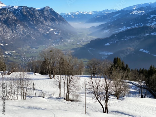 Winter atmosphere in spacious subalpine valley Seeztal along the Seez River between Lake Walensee and the Rheintal Valley, Walenstadtberg - Canton of St. Gallen, Switzerland (Schweiz) photo