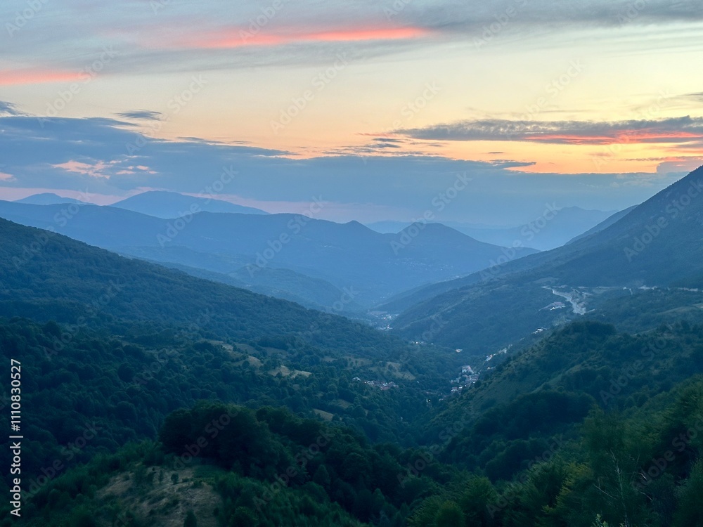 Fototapeta premium mountains and clouds and sunset