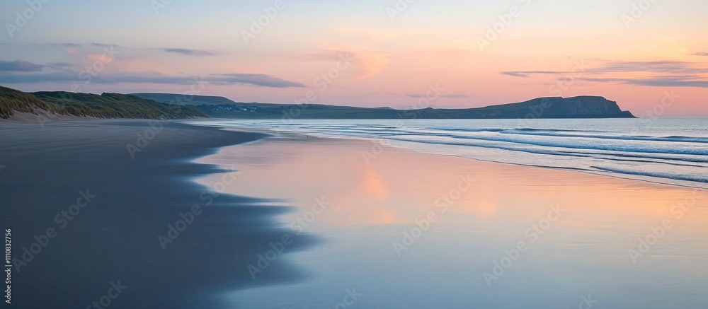 Pink Sunset Over Sandy Beach with Calm Waves Reflecting the Sky. Pink Sunset Over Sandy Beach with Calm Waves Reflecting the Sky.