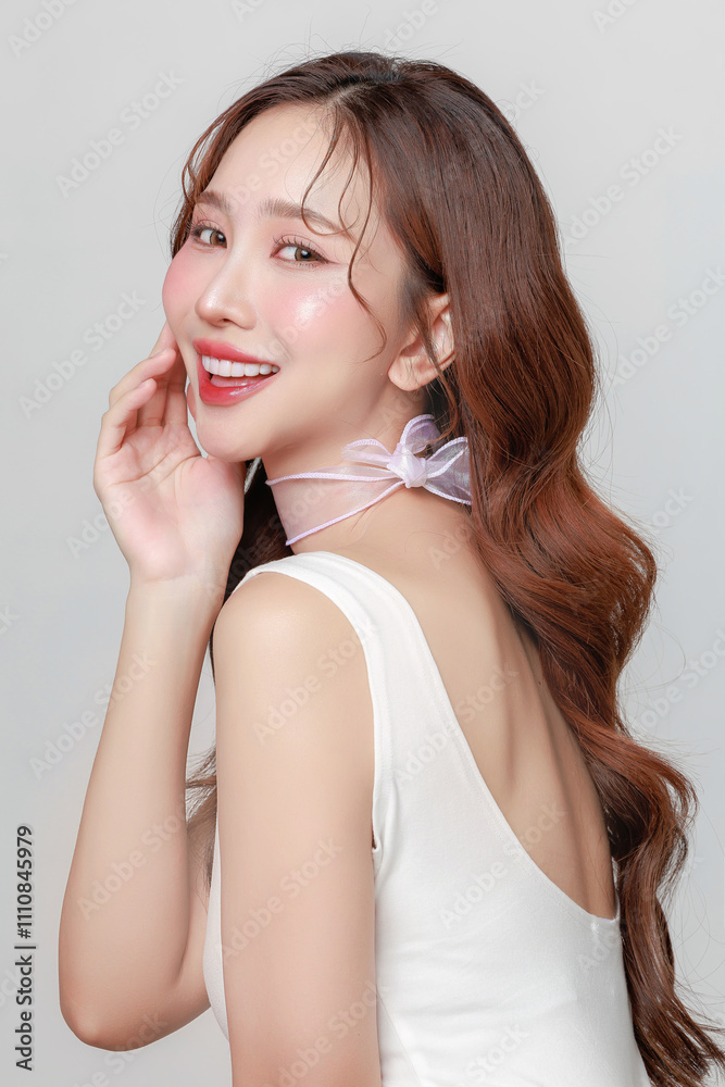 Pretty Asian woman model perfect clear fresh skin smile on isolated grey background. Portrait female beauty blogger make up artist in studio. Skincare, plastic surgery, spa concept. Pretty Asian woman model perfect clear fresh skin smile on isolated grey background. Portrait female beauty blogger make up artist in studio. Skincare, plastic surgery, spa concept.