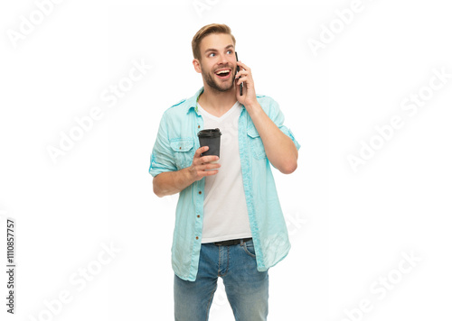 Coffee break during morning call of busy man talking on phone isolated on white