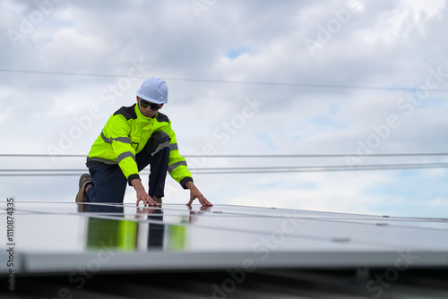 Wallpaper Mural Men technicians mounting photovoltaic solar moduls on roof of house. Torontodigital.ca